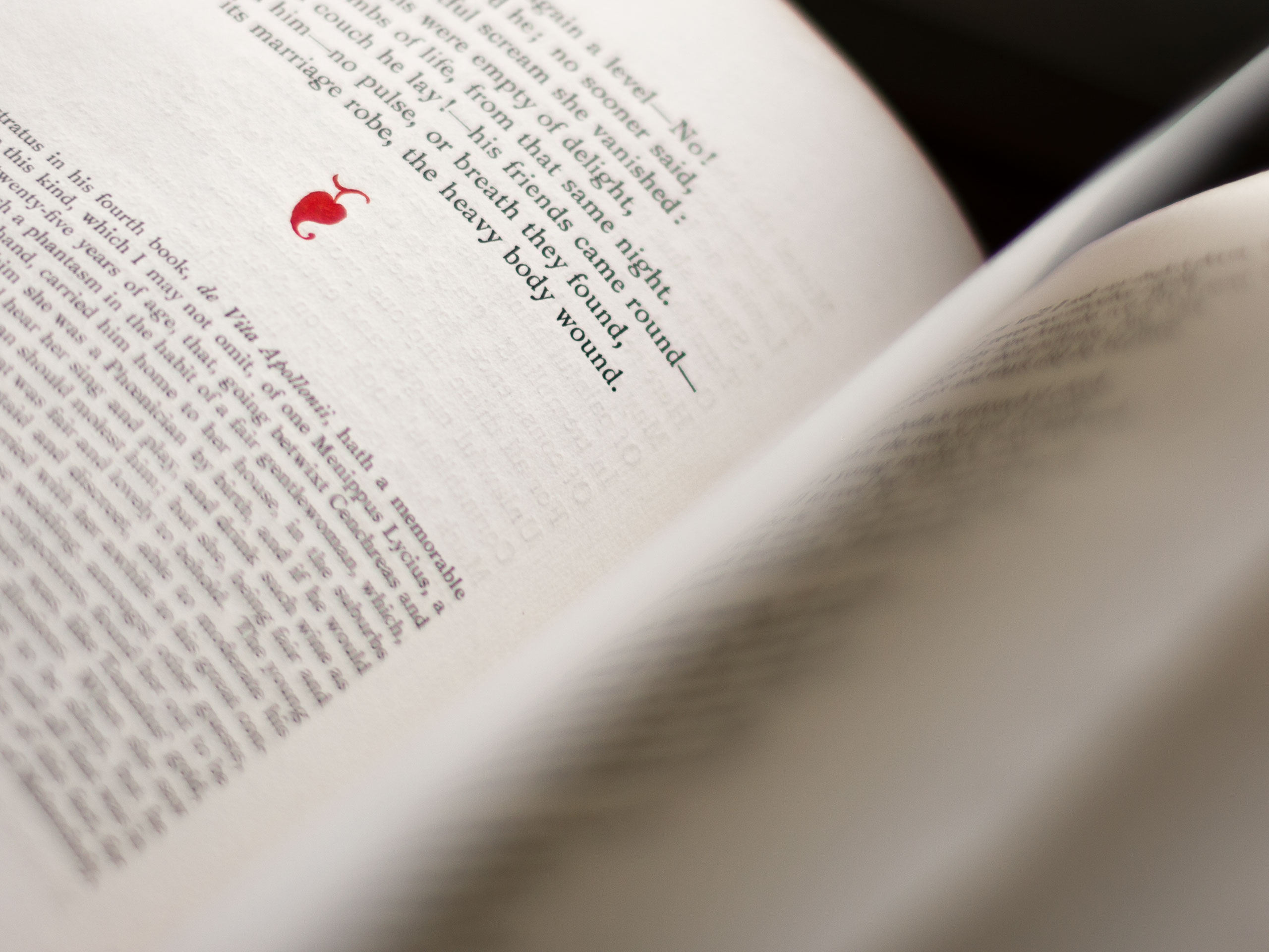 A close-up photograph showing a page from the beautifully printed Poems of John Keats (Chiswick Press, 1904)