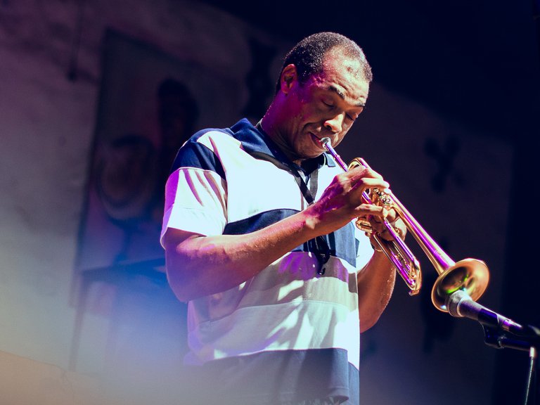 Femi Kuti playing trumpet
